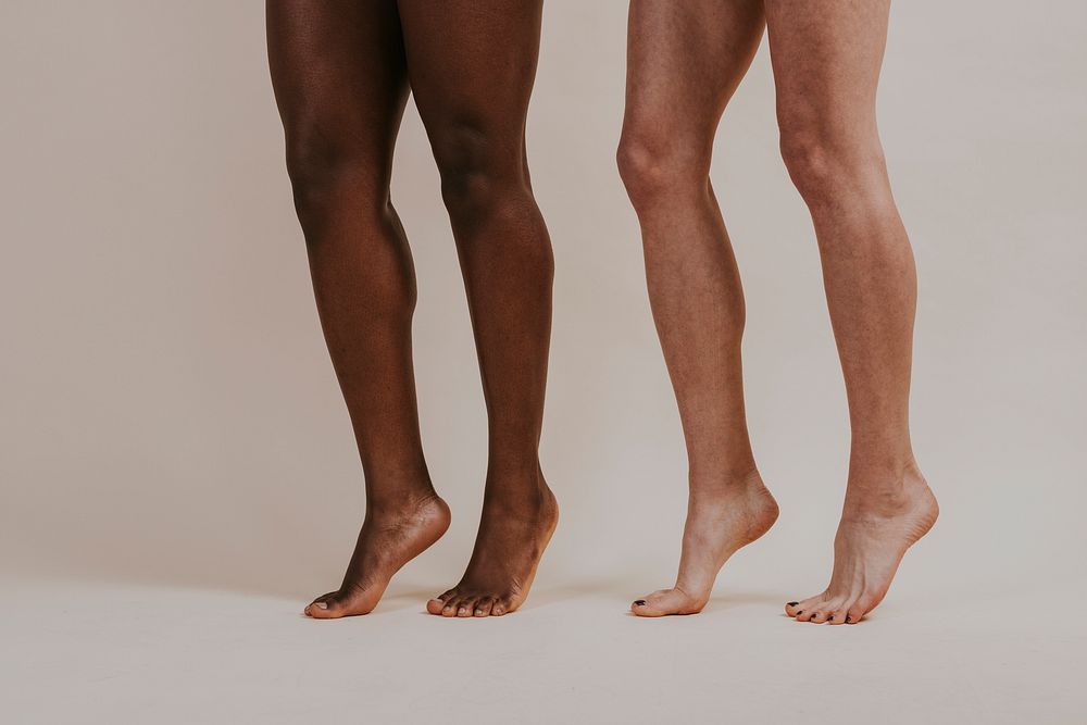 Different skin tone women's legs photo