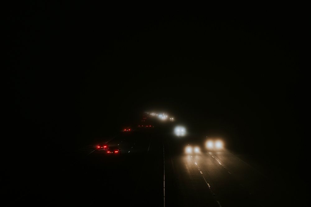 Car headlights background, night aesthetic