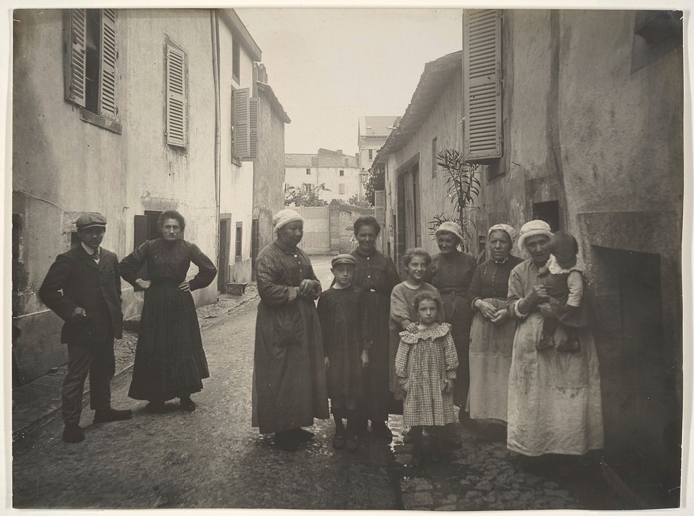 Group of Adults and Children on a Village Street in the Auvergne