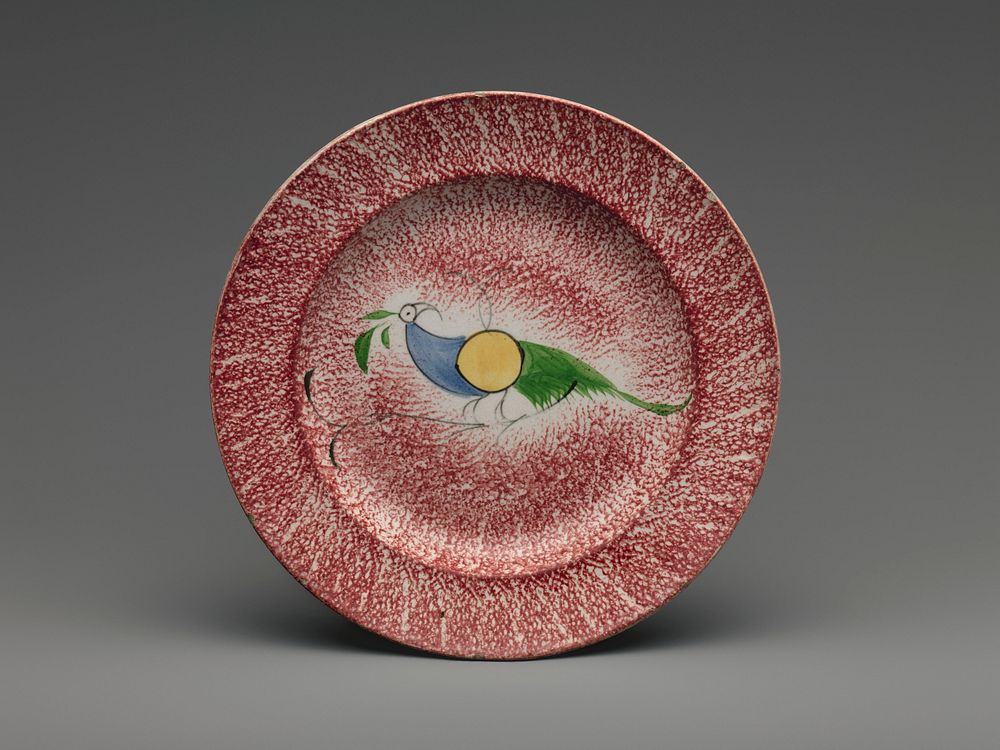 Plate with peafowl