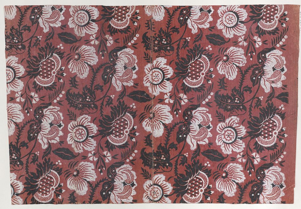 Red book cover with black and white floral pattern