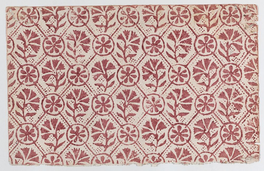 Sheet with overall red geometric and floral pattern