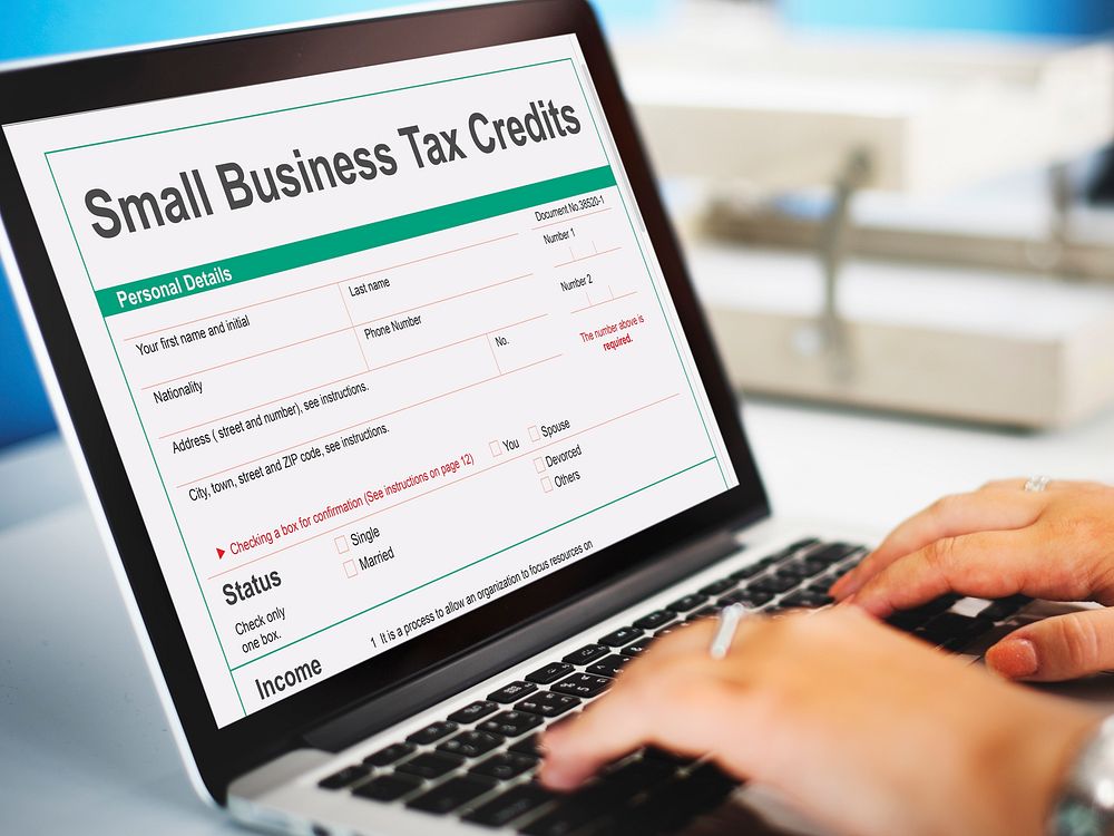 Small Business Tax Credits Claim Return Deduction Refund Concept