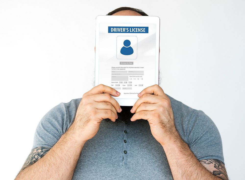 Man holding network graphic overlay digital device covering face