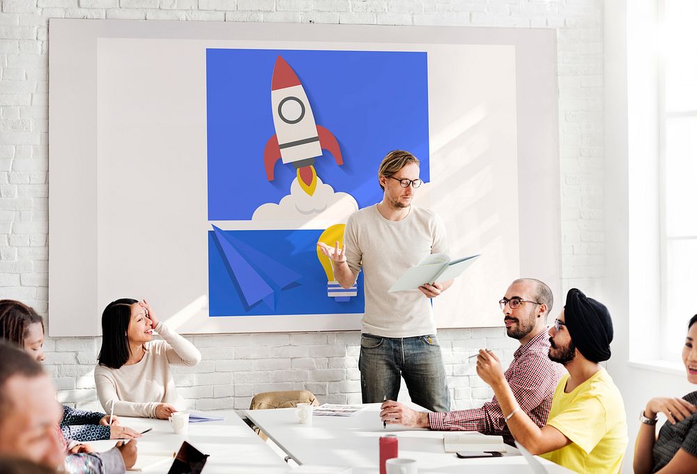 Workers working on network graphic overlay whiteboard