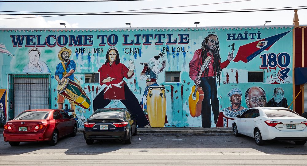                         An unusual and, at first glance, incomplete welcome sign in Miami, Florida's Little Haiti, long a…