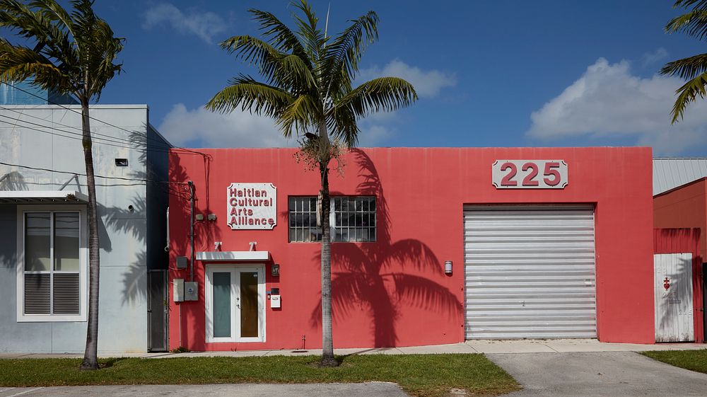                         Brightly colored building in Miami, Florida's Little Haiti, long a neighborhood populated by many…