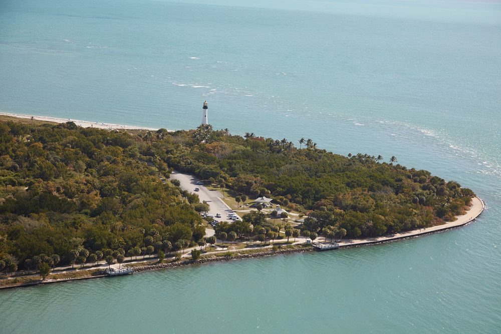                         Aerial view of the Cape Florida Lighthouse in Key Biscayne, a barrier island town across the…