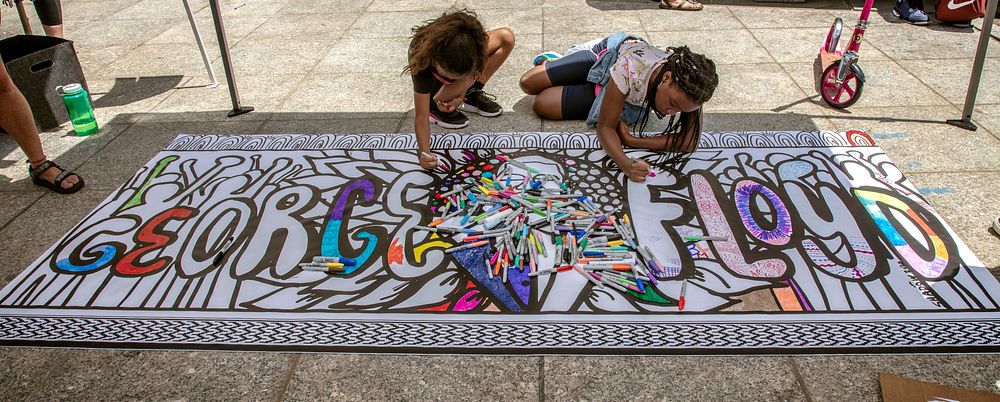                         Black Lives Matter Art and signs during the 2020 Juneteenth Celebration on Black Lives Matter Plaza…
