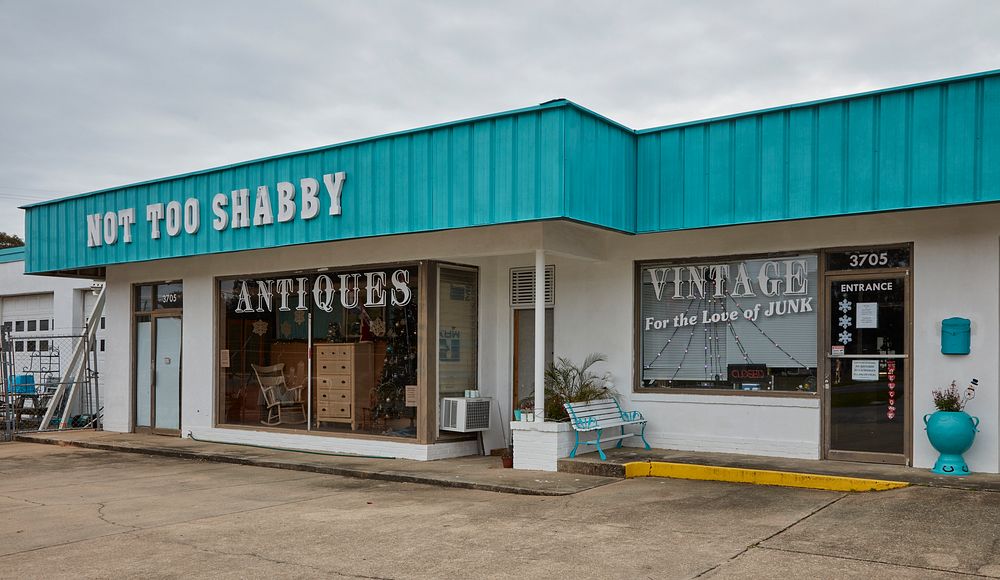                         The goods for sale in this roadside antiques and collectibes store in the Bayou Chico section of…
