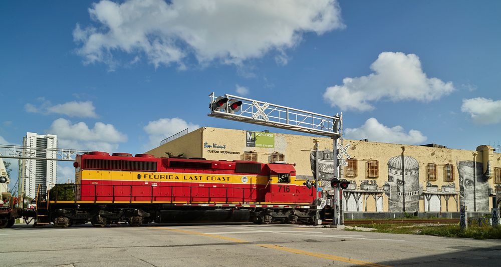                         A diesel locomotive passes in the Wynwood neighborhood of Miami, Florida, which Wikipedia calls "one…