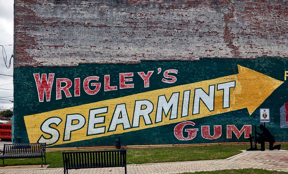                         An old Wrigley's Spearmint Gum advertising mural on a wall along a park in Trenton, a small city in…
