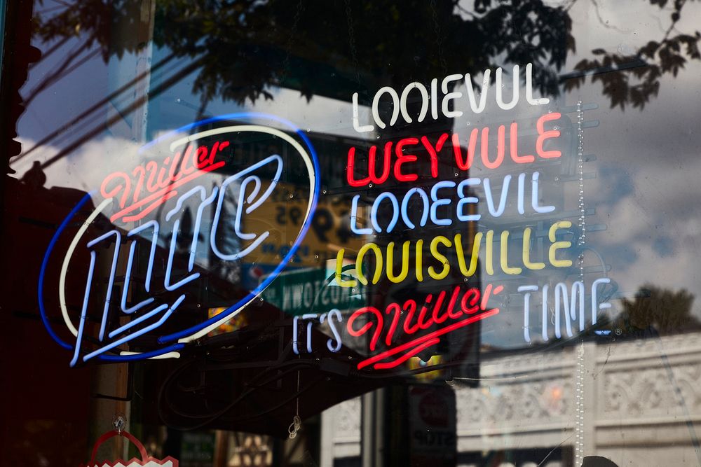                         Sign in a store window in the lively Highlands Neighborhood of Louisville, Kentucky's largest city…
