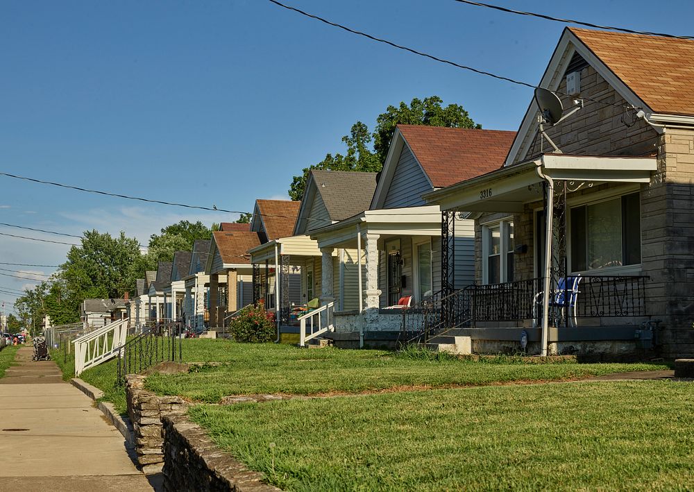                         A long row of classic "shotgun houses" in Louisville, Kentucky's largest city, on the south shore of…
