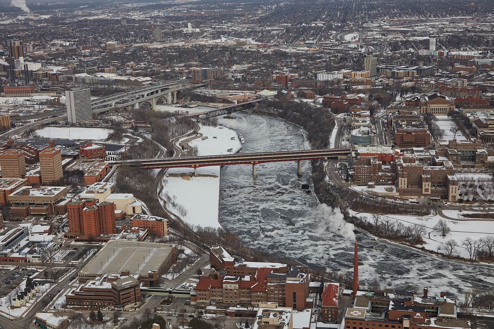                         Wintertime aerial view of Minnesota's famous "Twin Cities" of Minneapolis and St. Paul, including…