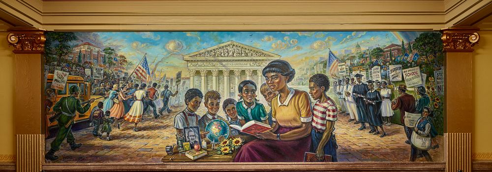                         Kansas City artist Michael Young created the Brown v. Board of Education mural inside the Kansas…