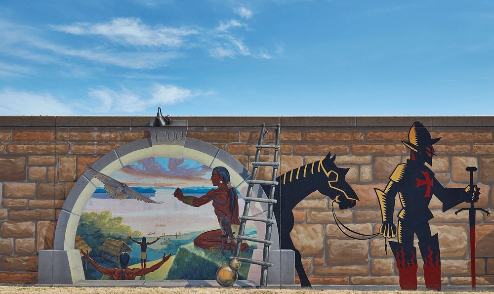                         One of 24 "Mississippi Tales" murals by artist Thomas Melvin on the floodwall of the Mississippi…