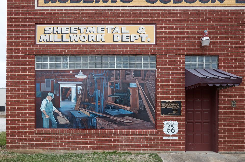                         "The Millworks" mural, which depicts an earlier scene at the very Roberts-Judson Millworks Building…