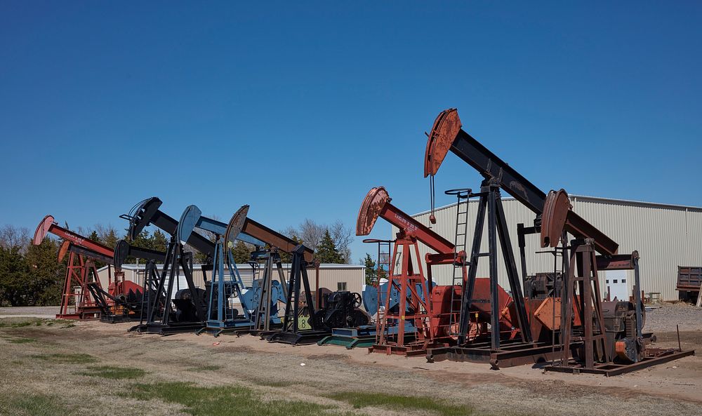                        A line of pumpjacks for sale in St. John, a small town in south-central Kansas                      …