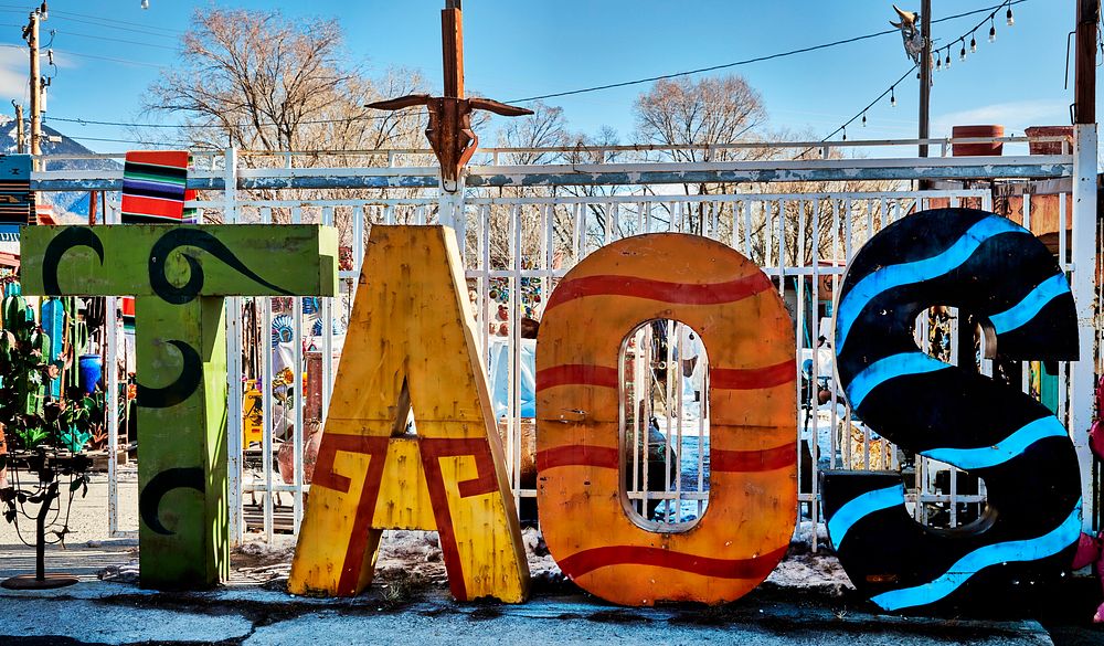                         The nearby city as art letters at the Camino Real Imports and Gift Shop on the road between Taos…