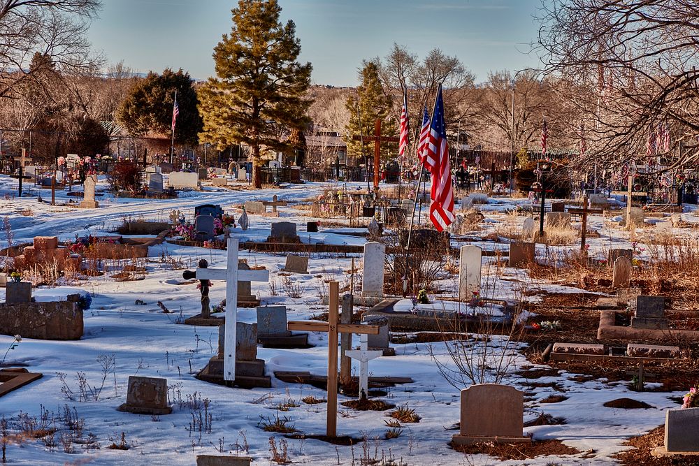                         The Sierra Vista Cemetery, one of 10 small graveyards in Taos, New Mexico, once a sleepy southern…