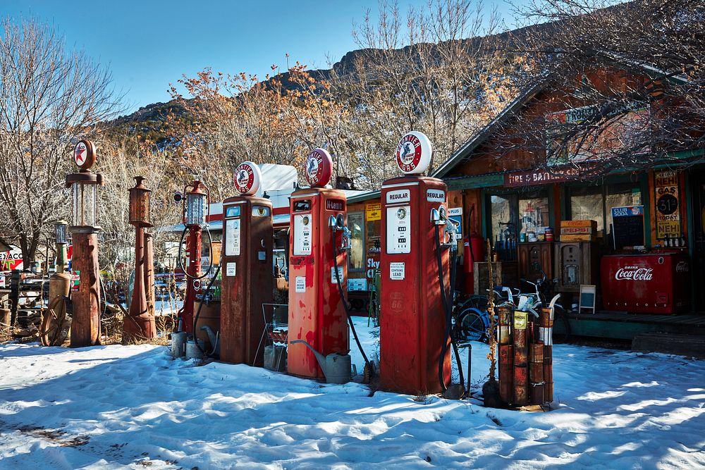                        Vintage gasoline pumps arrayed outside a nostalgic roadside attraction, the Classical Gas Museum, in…