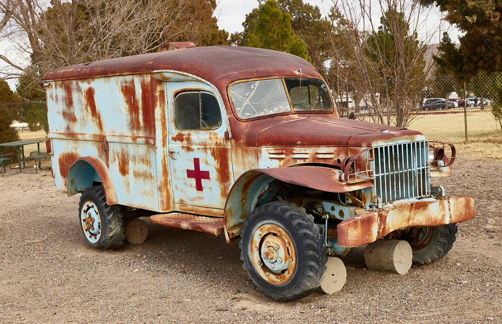                         A vintage, but rusted and busted-up, military ambulance at Veterans Memorial Park in Truth or…
