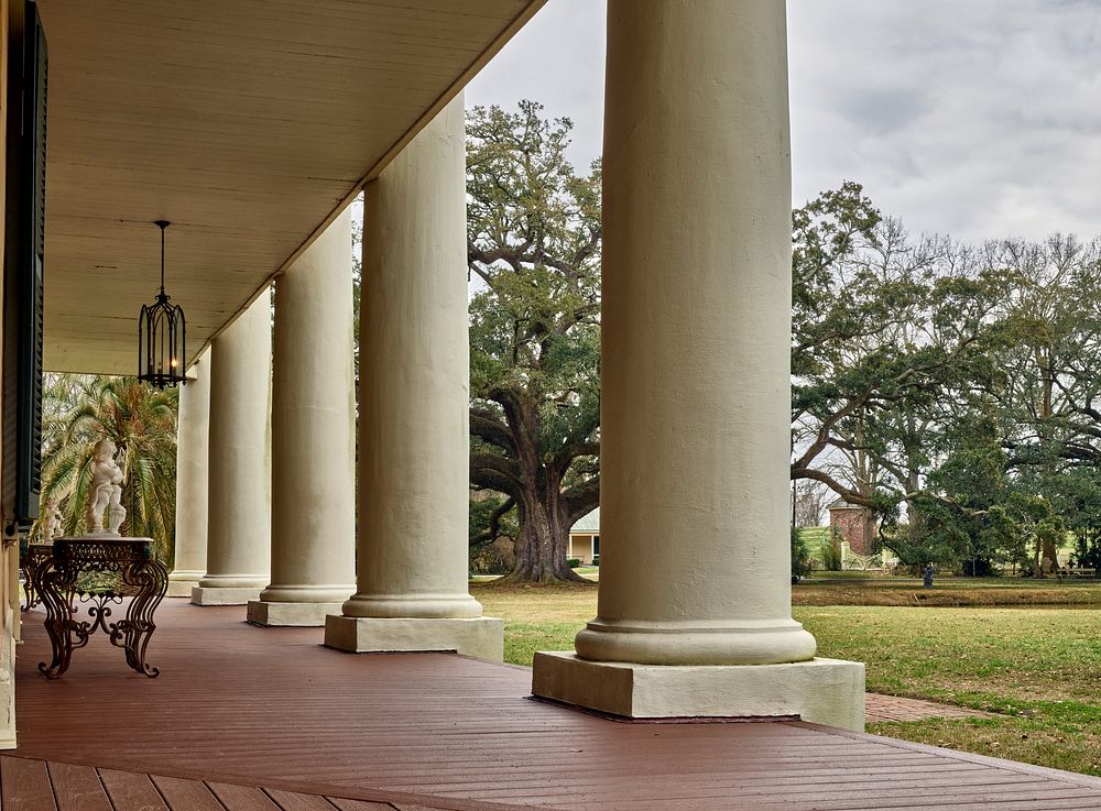                         The western porch of the estate mansion at Houmas House and Gardens, a Louisiana plantation-era…
