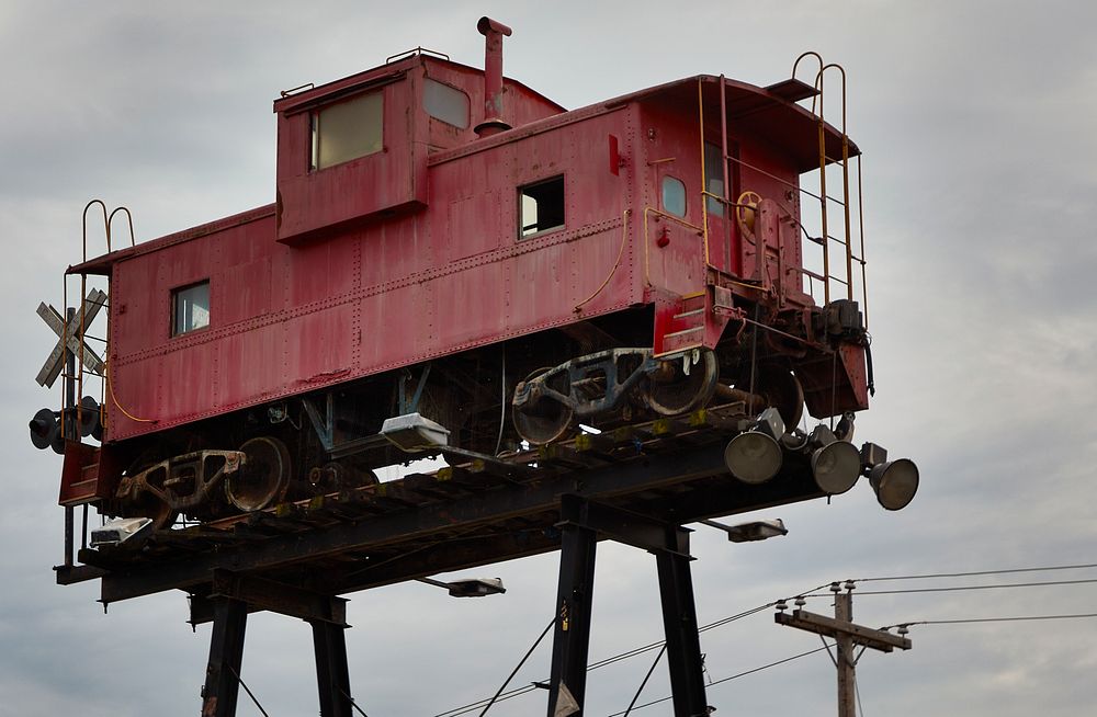                         An attention-getting railroad caboose high above Casey Jones Village in Jackson, a city in central…