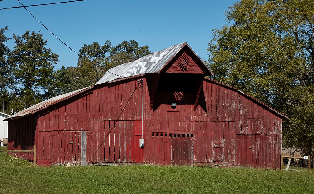                        A classic red hay barn on the Hickory Hill Farms property in Cannon County, Tennessee, near…