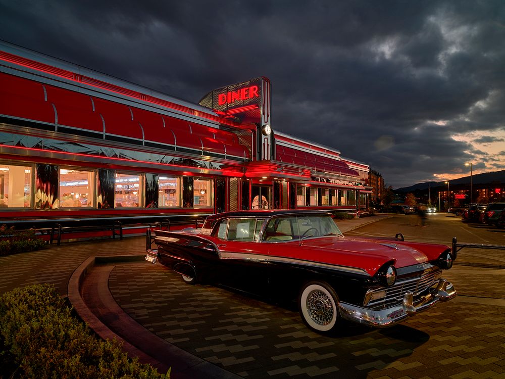                         Dusk accentuates the nostalgic ambience at the Sunliner Diner, which evokes the look and feel (and…