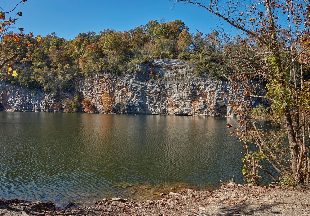                         The rock face, and lake below, at the Mead's Quarry, part of the Ijams Nature Center in Knoxville…