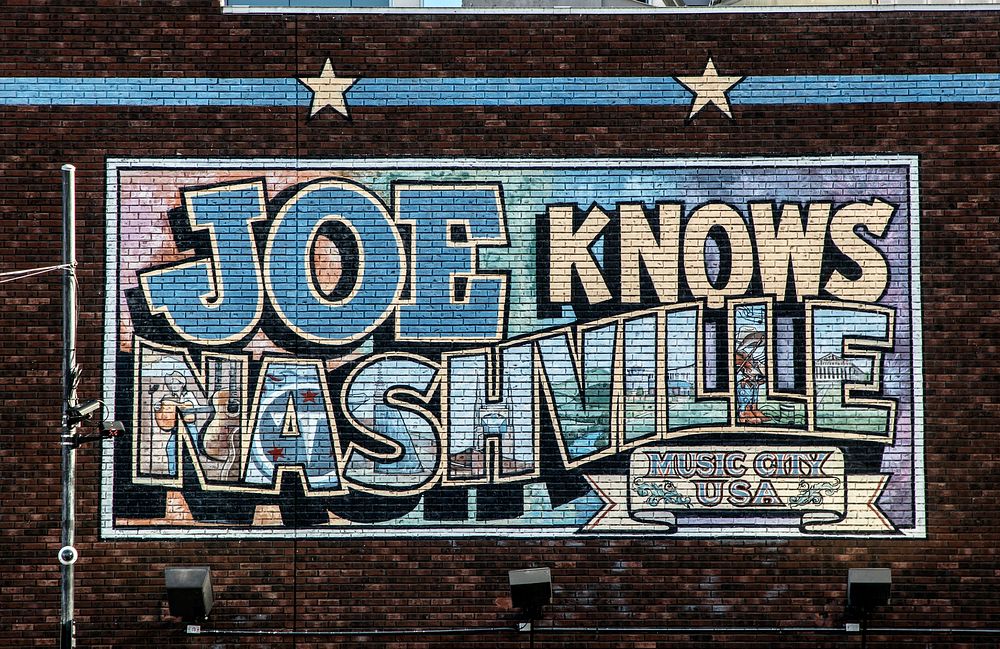                         Sign painted on the sign of a Joe's Crab Shack restaurant location in Nashville, the capital city of…