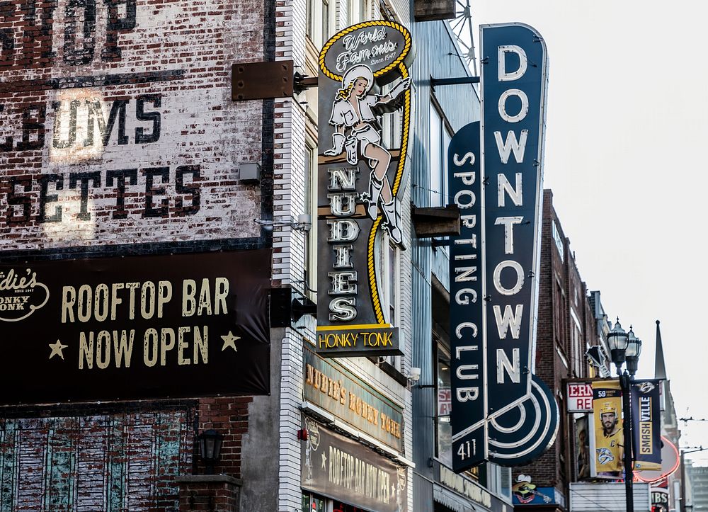                         An array of old and new advertising signs in Nashville, the capital city of the U.S. mid-South city…