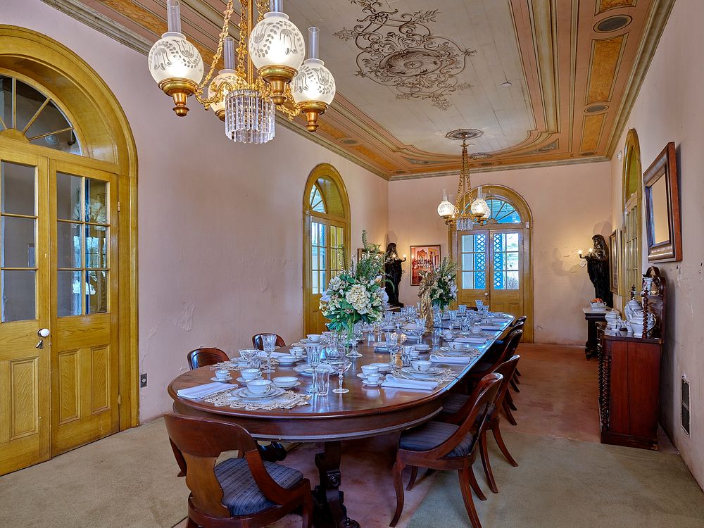                         Lavish dining room at San Francisco Plantation house, built in the 1850s on land now (as of 2021) on…