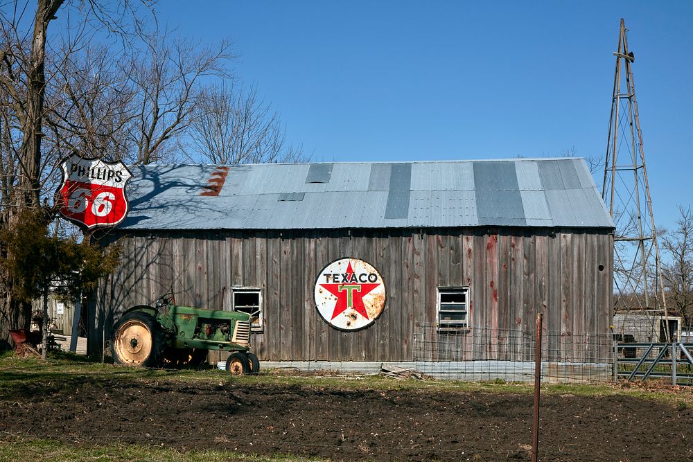                         A rural barn, decorated with vintage gasoline signs, in Randolph County, Missouri                   …