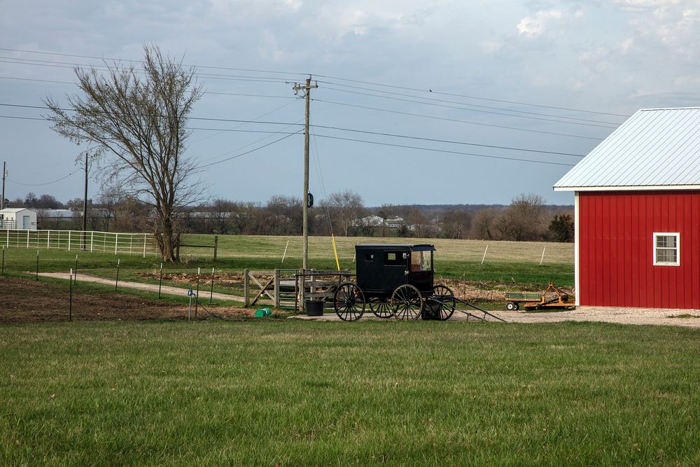                         An Amish buggy parked along a country road near Versailles, Missouri                        