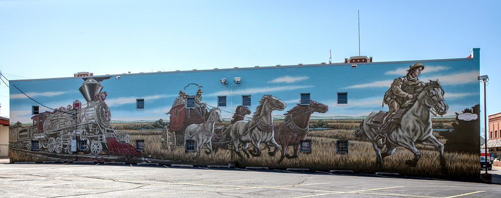                         A mural in St. Joseph, the principal city in the northwest corner of Missouri, depicting three…