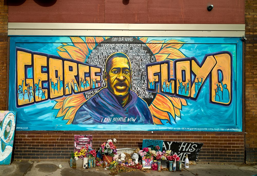                         A mural by Xena Goldman, Cadex Herrara, and Greta McLain is part of the George Floyd Memorial to a…