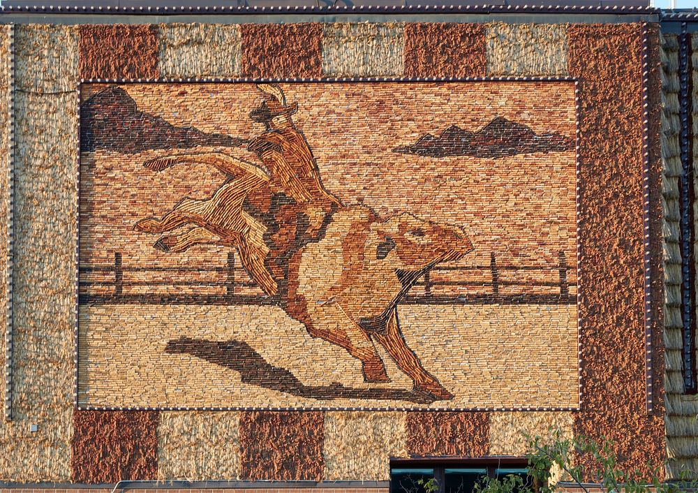                        Decorative, woven mural on the Corn Palace, an arena and event venue that is one of Midwest…