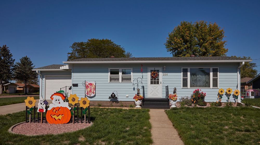                         Halloween holiday decorations in front of a modest home in Yankton, a small city on the Missouri…