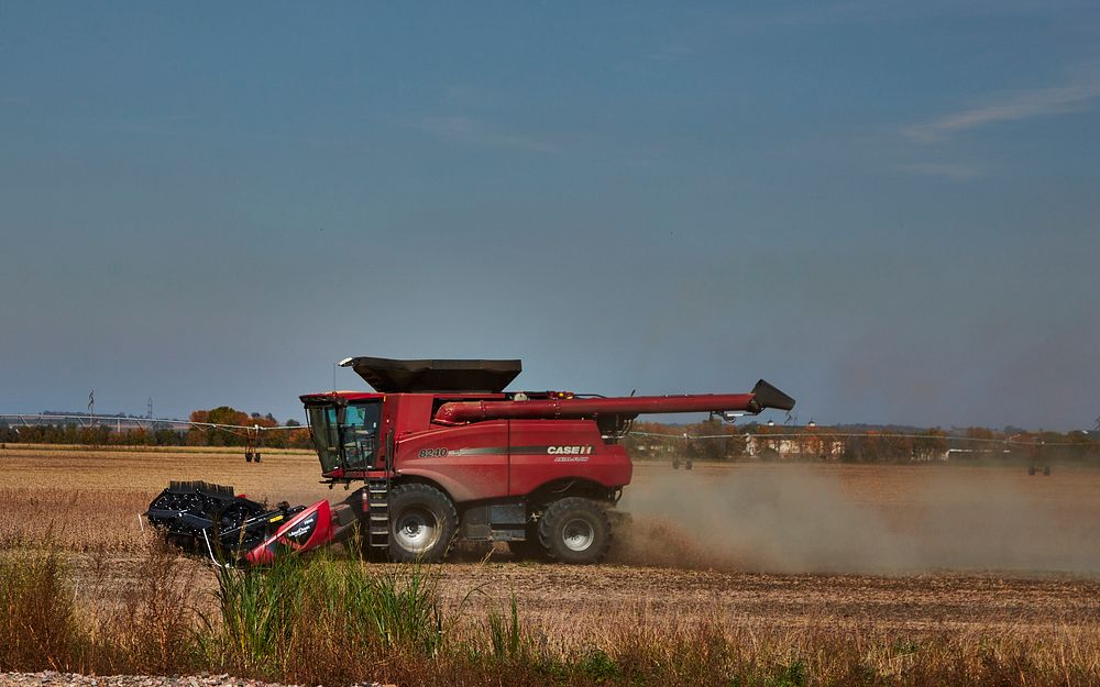                         A harvester at work in Clay County, South Dakota, near Yankton                        