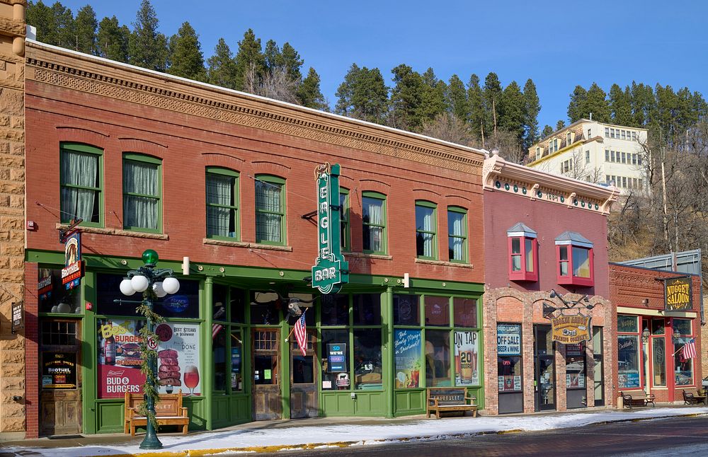                         The Eagle Bar and adjoining enterprises in Deadwood, a legendary Wild West-era town in the Black…
