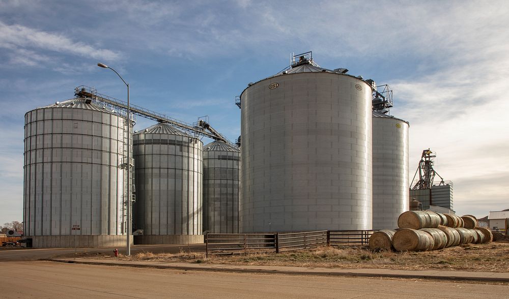                         An array of modern metal silos beside a railroad spur in Fort Pierre, a small city across the…