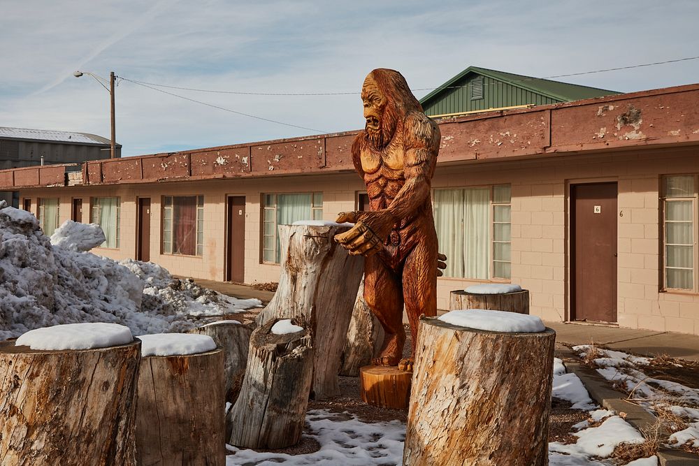                         A Bigfoot carving commands the grounds of the Wall Motel in tiny Wall, South Dakota (2020 census…