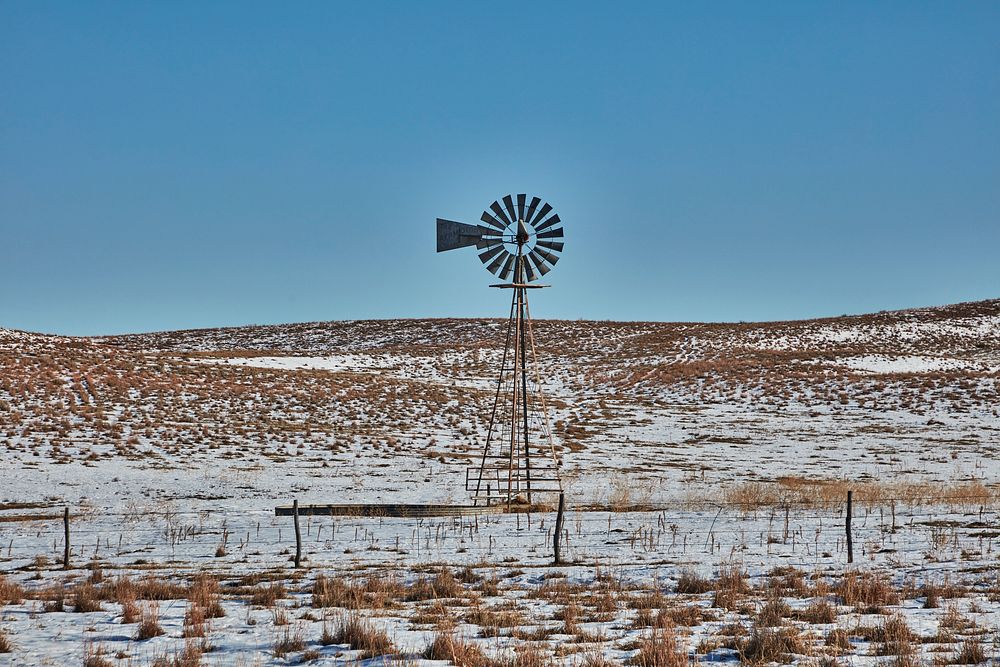                         Windmill on a desolate field in mid-December, near Merriman in Cherry County, Nebraska              …