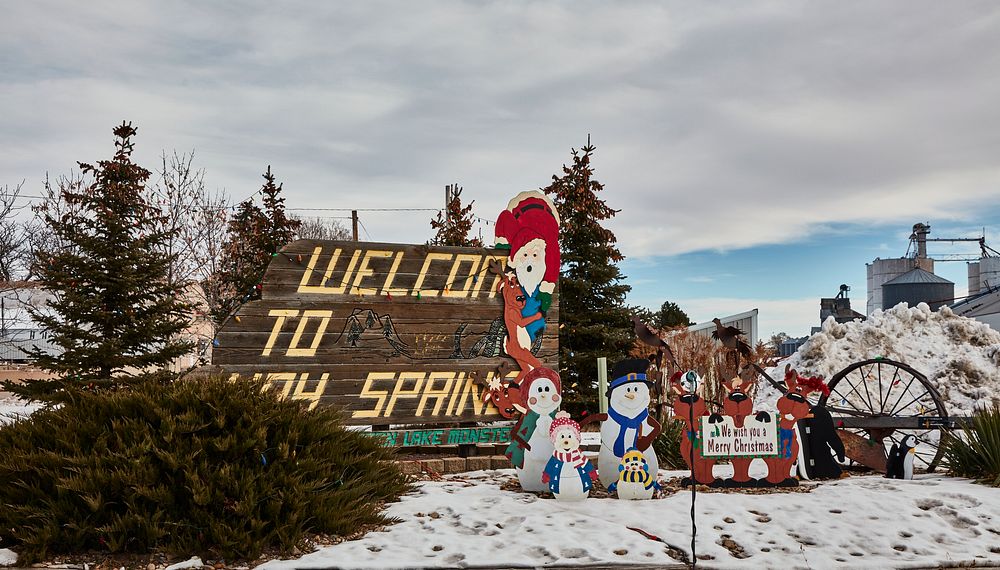                         Christmastime welcome sign in Hay Springs, a small town of about 600 people (as of 2021) in…