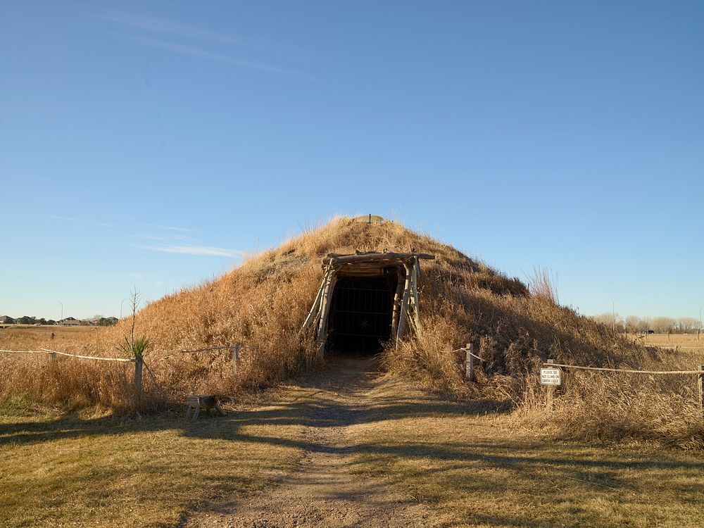                         A circa-1830 Pawnee (Native American tribe) earth lodge at the Railroad Town outdoor living-history…