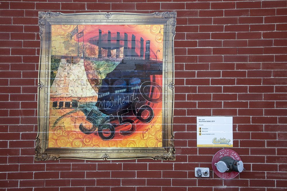                         Kim Jore's 2019 mural, entitled "Moorhead 56560," on a brick wall of the Kassenburg Building in…