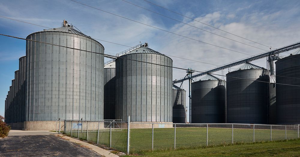                         An array of metal barley silos next to the North Dakota Golden Growers Cooperative headquarters in…